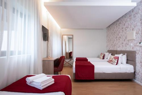 Essence Inn Marianos Hotel