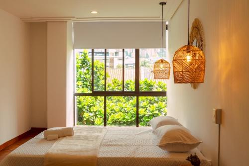 Elegante habitación baño compartido en Poblado-B11