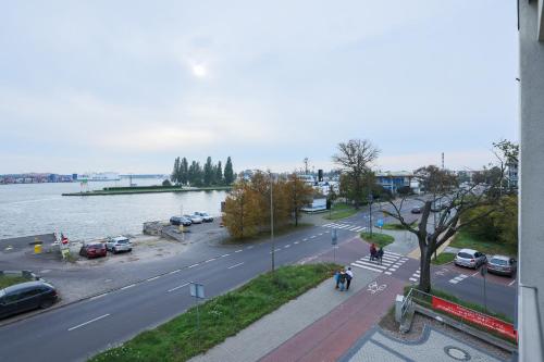 Nowa Flotylla Stylowy Apartament z Widokiem na Port by Noclegi Renters