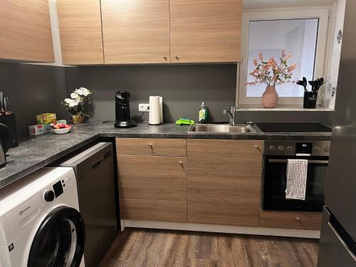 кухня, Nahe Kiel, Neues Ferienhaus an der Ostsee mit Sauna,Kamin und Garten,Parkplatz,5 Betten, 3 Schlafzim in Osdorf