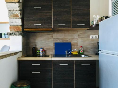 кухня, Sarris Ligaridia Apartments in Іос