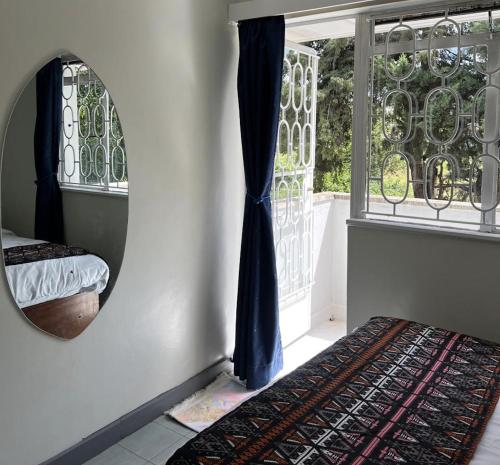 Diggz - Private Townhouse, Garden Views near Junction Mall, Найроби (фото 2)