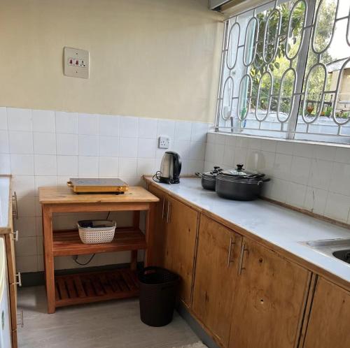 Diggz - Private Townhouse, Garden Views near Junction Mall, Найроби (фото 5)