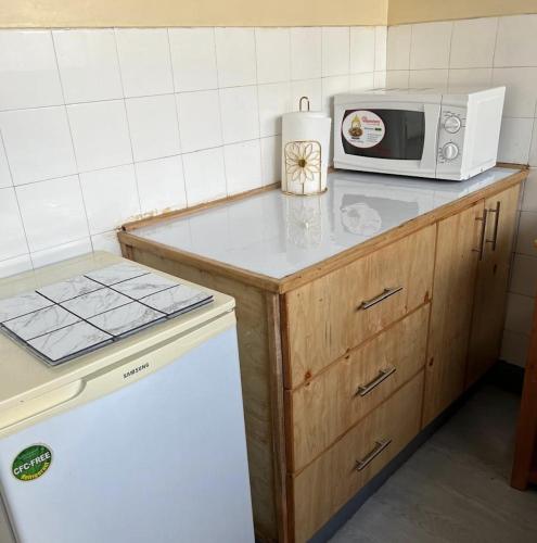 Diggz - Private Townhouse, Garden Views near Junction Mall, Найроби (фото 8)