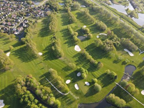 Campo de golf en el alojamiento, Oktopus-Lofts - Houseboat in Lelystad