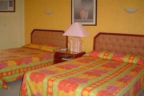 Hotel Debliz Set in a prime location of Campeche, Hotel Debliz puts everything the city has to offer just outside your doorstep. The property features a wide range of facilities to make your stay a pleasant experi