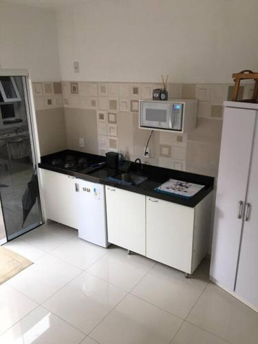 Casa confortável em condomínio (Casa confortavel em condominio) in Salgado Filho Airport