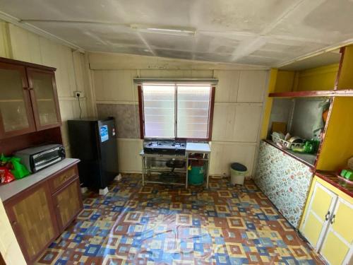 Dom (100 m²) w okolicy Pulau Duyong z 1 sypialnią/ami i 1 łazienką/ami (Hakim Homestay) in Pulau Duyong