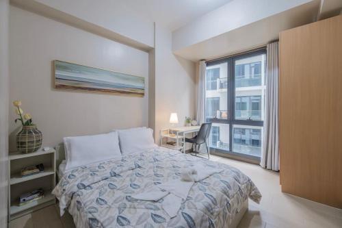StayHere The Florence Luxe 1BR Near Venice Mall, Metro Manila