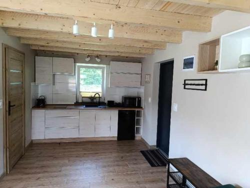 Dom wypoczynkowy Pod kasztanem 2 nad jeziorem in โรบุญ