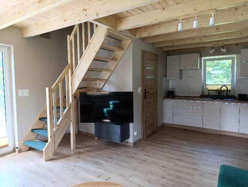 Dom wypoczynkowy Pod kasztanem 2 nad jeziorem in โรบุญ