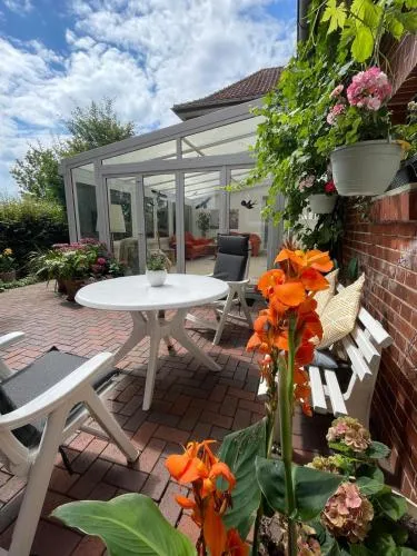 Ferienwohnung mit WINTERGARTEN in Bahnhofsnähe in Eystrup, Deutschland
