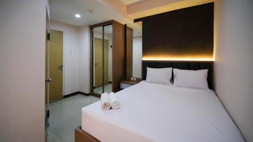 Spacious 2BR Combine Unit at Bale Hinggil Apartment By Travelio, Surabaya