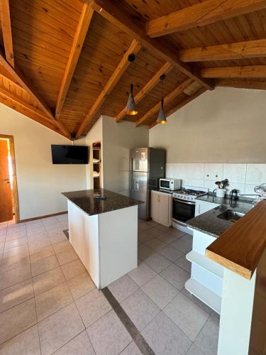 Kitchen, Antu Mahuida Apartments in San Carlos de Bariloche