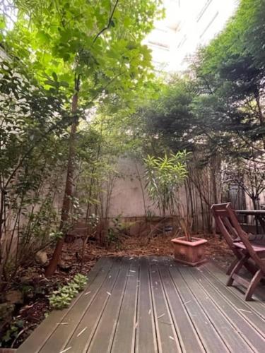 Grande chambre privée sur jardin arboré, Parigi (foto 9)