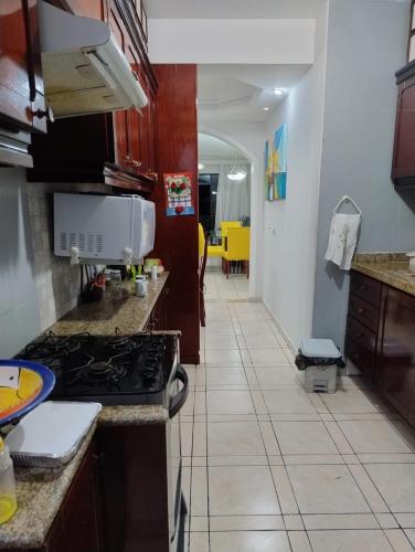 ห้องครัว, Apartamento Praia de Pitangueiras Guarujá SP (Apartamento Praia de Pitangueiras Guaruja SP) in บาร์ราฟุนดา