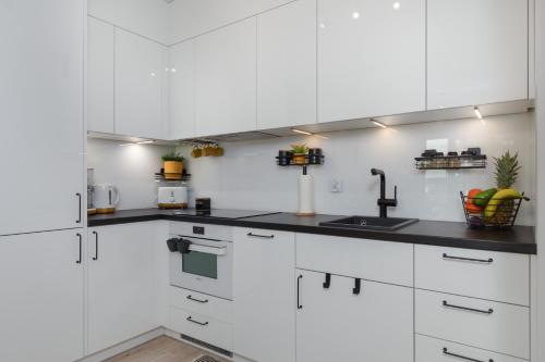 Apartment with Balcony room in Dziwnow Luxurious Apartment No1 by the River by Renters Prestige