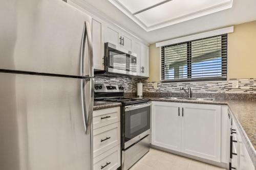 Ocean View with a beachfront pool at Ocean Trillium Condo ~ 702 in New Smyrna Beach, USA