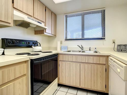 Ocean View with a beachfront pool at Ocean Trillium Condo ~ 203 in New Smyrna Beach, USA