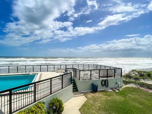 Ocean View with a beachfront pool at Ocean Trillium Condo ~ 204 in New Smyrna Beach, USA