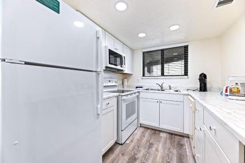 Ocean View with a beachfront pool at Ocean Trillium Condo ~ 304 in New Smyrna Beach, USA