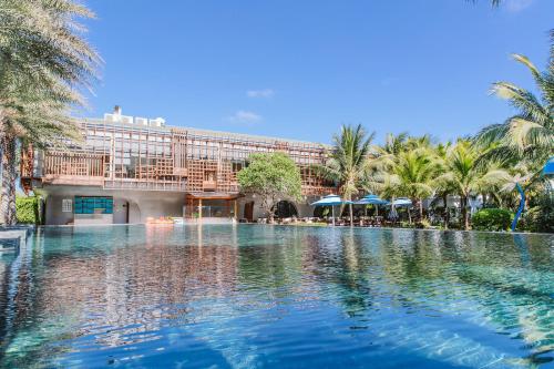 Swimming pool, Le Palmier Ho Tram Resort in Ho Tram Beach