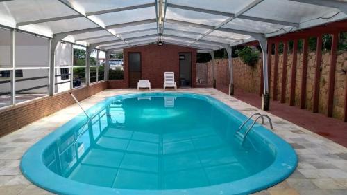 Swimming pool, Ape em Ponta das Canas - 40m do mar - NDI003 in Ponta das Canas