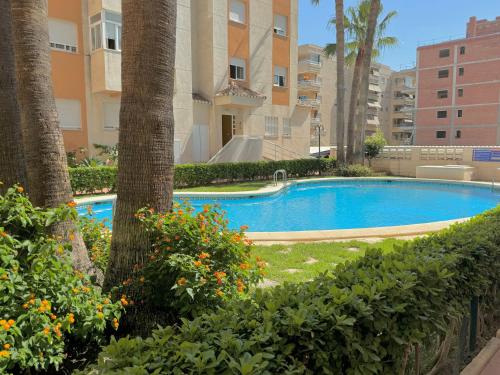  .Apartamento 1a linea de playa + piscina + parking DAIMUS in Daimuz