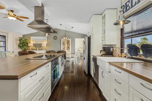Canalfront Oasis with BBQ Patio Kayaks and Dock! - image 12