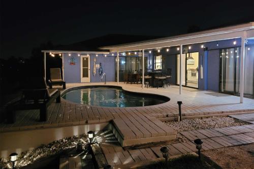 Canalfront Oasis with BBQ Patio Kayaks and Dock! - image 6