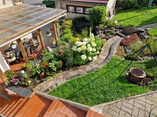 Dārzs, Ferienwohnung Am Öpitzer Berg (Ferienwohnung Am Opitzer Berg) in Possneck