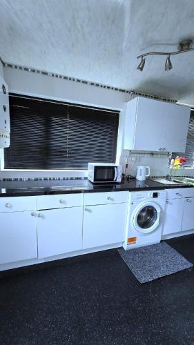 Kitchen, Ritchie Guest House in Wigan