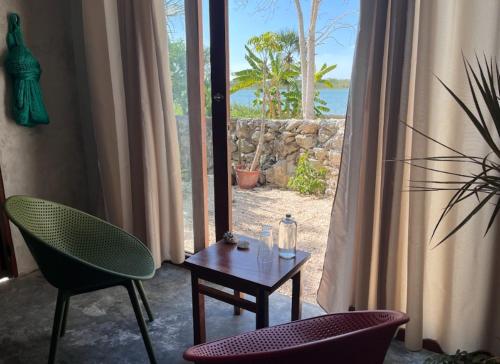 สภาพแวดล้อมโดยรอบ, Casa Ik en Coba in มาการิโอโกเมซ