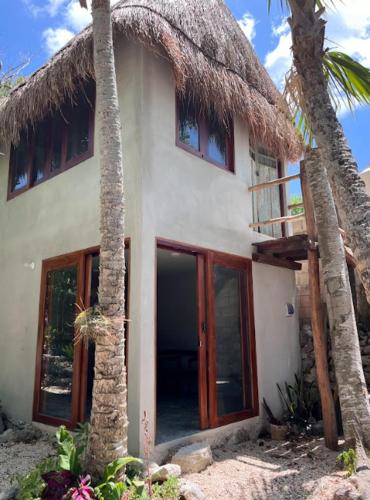 ทางเข้า, Casa Ik en Coba in มาการิโอโกเมซ