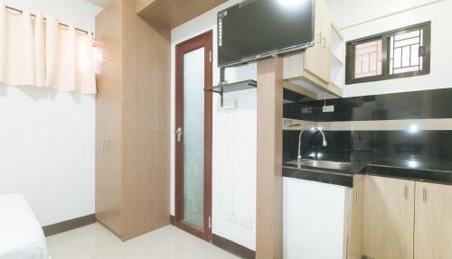 RedDoorz @ MGP Apartelle near Espana - 주방