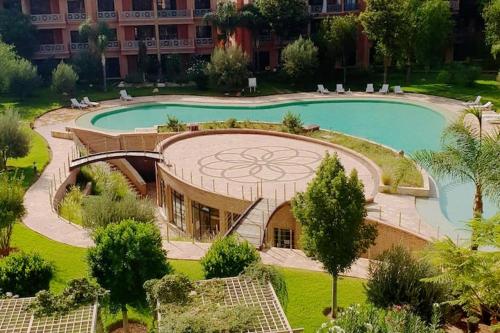 Bel appartement RDJ face piscine résidence haut standing, Marrakech
