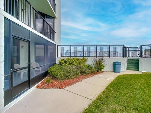 Ocean View with a beachfront pool at Ocean Trillium Condo ~ 103 in New Smyrna Beach, USA