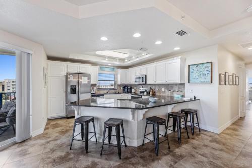 Large Corner Unit at Ocean Walk with Sneak Peak of the Ocean ~ OW20-501 in New Smyrna Beach, USA