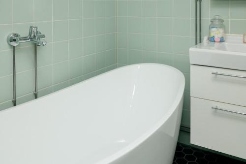 Bathroom, Mantylinnan Huoneistomajoitus in Mantta