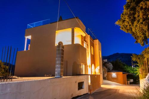 Exterior view, Luxury apartment with rooftop pool in Meronas in Stavros