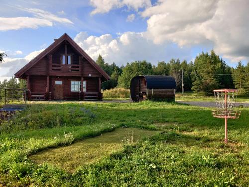 . Tapa Cottage next to disc golf.