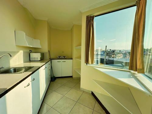 Cocina, Suitesecu Rentals Guayaquil in Guayaquil