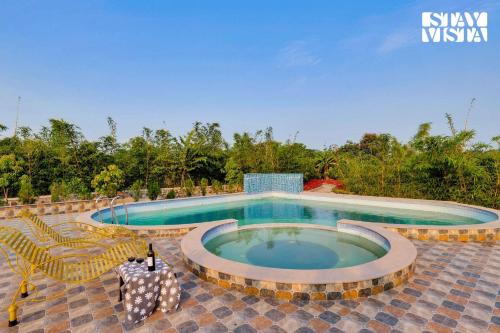 StayVista's Green Embrace - Villa in Bor Tiger Reserve with Swimming Pool, Rainshower, Terrace & Lawn
