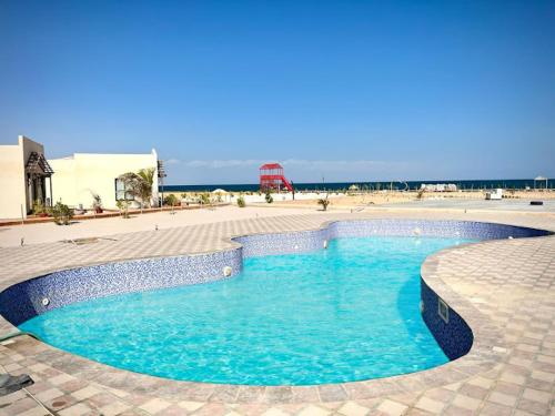 Swimming pool, Sugardunes Beach Resort in Muhut
