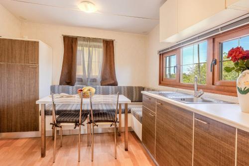 Deluxe Bungalow room in Camping Village Le Calanchiole