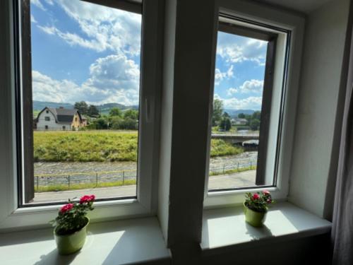 Penzion a Rybářská bašta U Jesetera (Penzion a Rybarska basta U Jesetera) in Bela Pod Pradedem