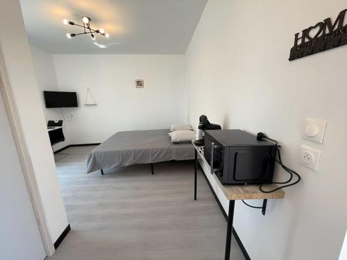 Studio B2 20m2 cosy 5min à pied des Gares (Studio B2 20m2 cosy 5min a pied des Gares) in Roanne