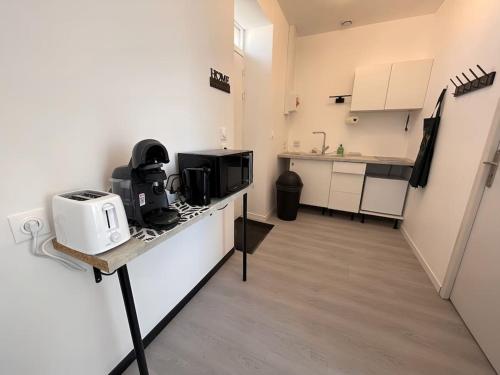 Studio B2 20m2 cosy 5min à pied des Gares (Studio B2 20m2 cosy 5min a pied des Gares) in Roanne