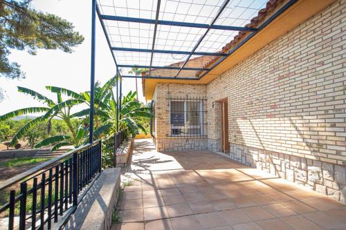 Villa con piscina y barbacoa para 13 personas cerca del metro in ปิกัสเซนต์