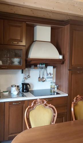 Villa Costanza Appartamento con balcone e vista giardino in มาเกรกลีโอ